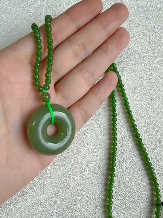 Qingshui Nephrite Ping An Kou Pendant